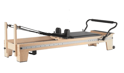 Eco Studio Full Track Pilates Reformer front view with custom wood frame